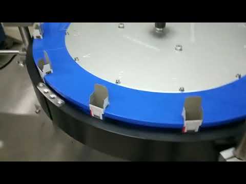 Automated cartoning machine for toothpaste and water bottles. Optimized for efficient packaging and easy operation.