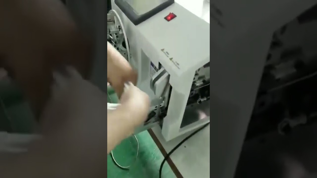 Automated wire winding and twist tying equipment for coil winding of cables.