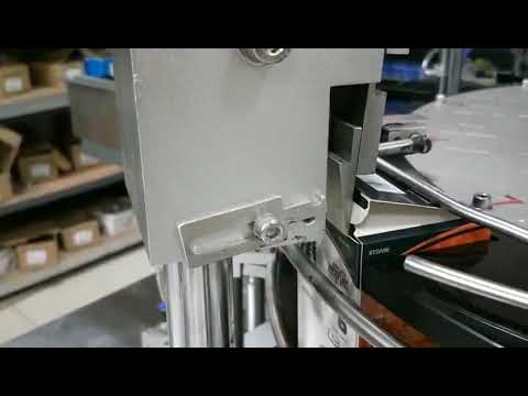 Automatic Cartoning Machine for Universal Oil with Buttons, optimized for efficiency.