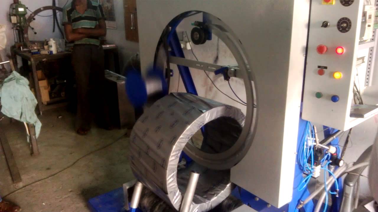 Coil Wrapping Machine with Vertical Stretching