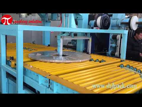 Coil packing machine for automatic stripping and packaging. Coil packing machine for automatic stripping and packaging.