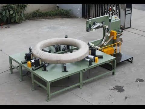 Coil packing machine for steel, cable, and iron wire with efficient wrapping and roll packaging capabilities.
