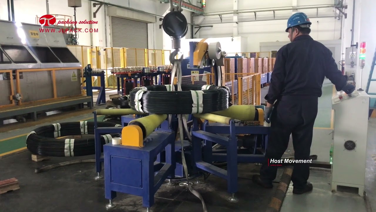 Coil packing machine for steel with ring packaging capability.