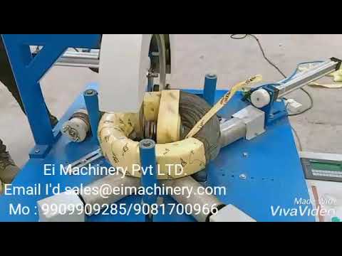 Coil wrapping machine for binding wire with improved efficiency.