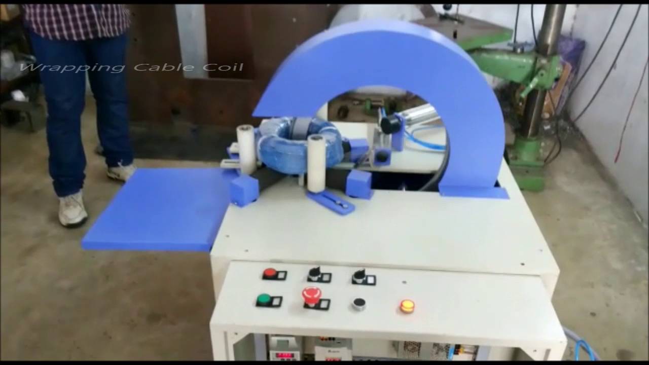 Coil wrapping machine for cables and wires, designed for efficient and optimized performance.