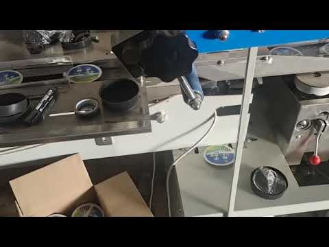 Compact Mosquito Coil Packaging Machine with Automatic Feeder for Efficient Shrink Wrapping.