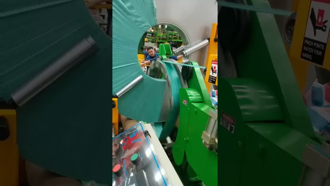 Compact coil packaging machine designed for efficient and accurate packaging of coils.