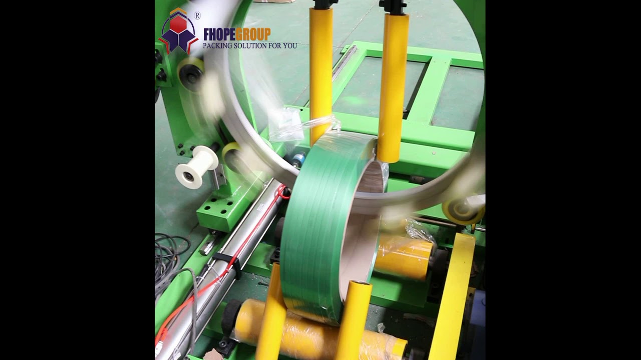 “Compact coil wrapping and packing machine for PET and PP belts”