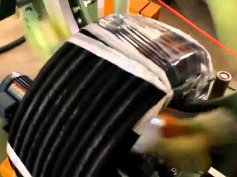 Compact hose and coil wrapping machines for efficient packing.