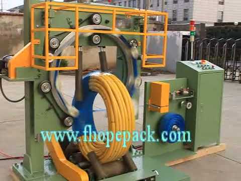 Compact hose coiling machine for efficient packaging. Compact hose coiling machine for efficient packaging.