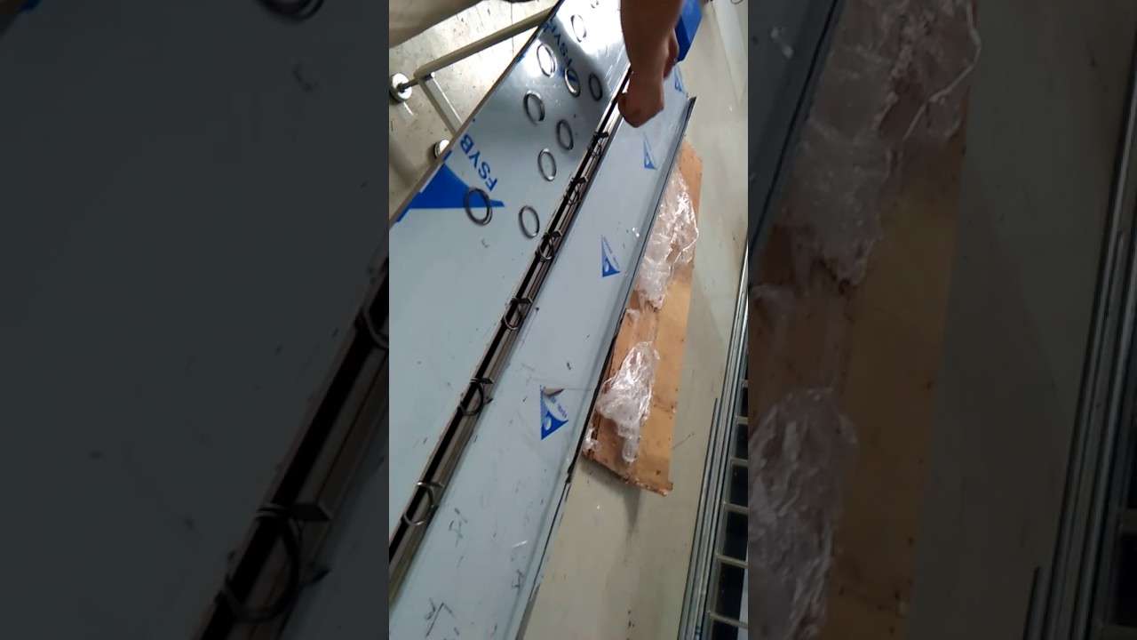 Compact round coil packaging machine designed for efficient and streamlined coil wrapping.