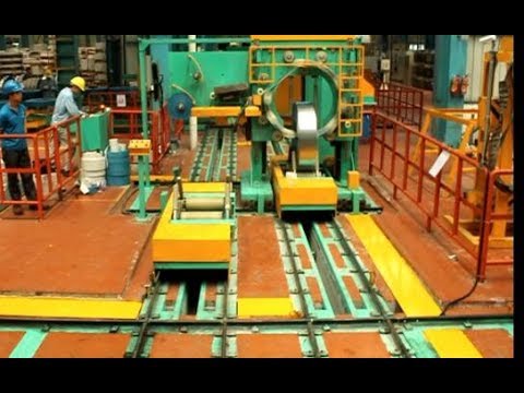 Efficient Coil Stretch Wrapping and Packing Machine for Online Use.