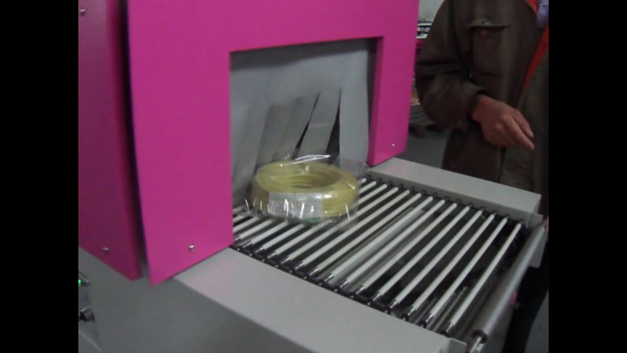 “Efficient Plastic Film Coil Shrink Packaging Machine”