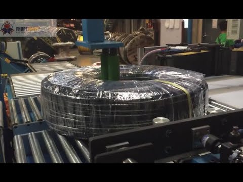 “Efficient packing machine for cable coils” “Efficient packing machine for cable coils”