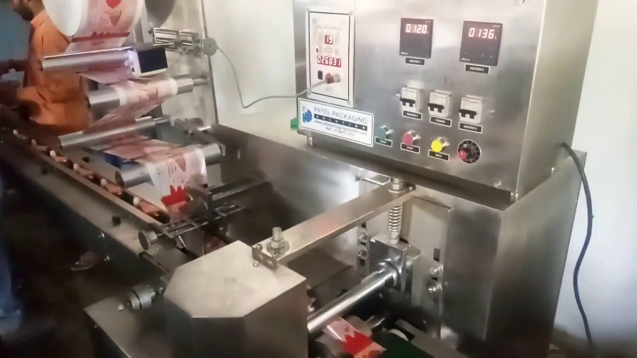 Efficient packing machine for kulfi and chocobar lolly. Contact +919601071072 in Ahmedabad.