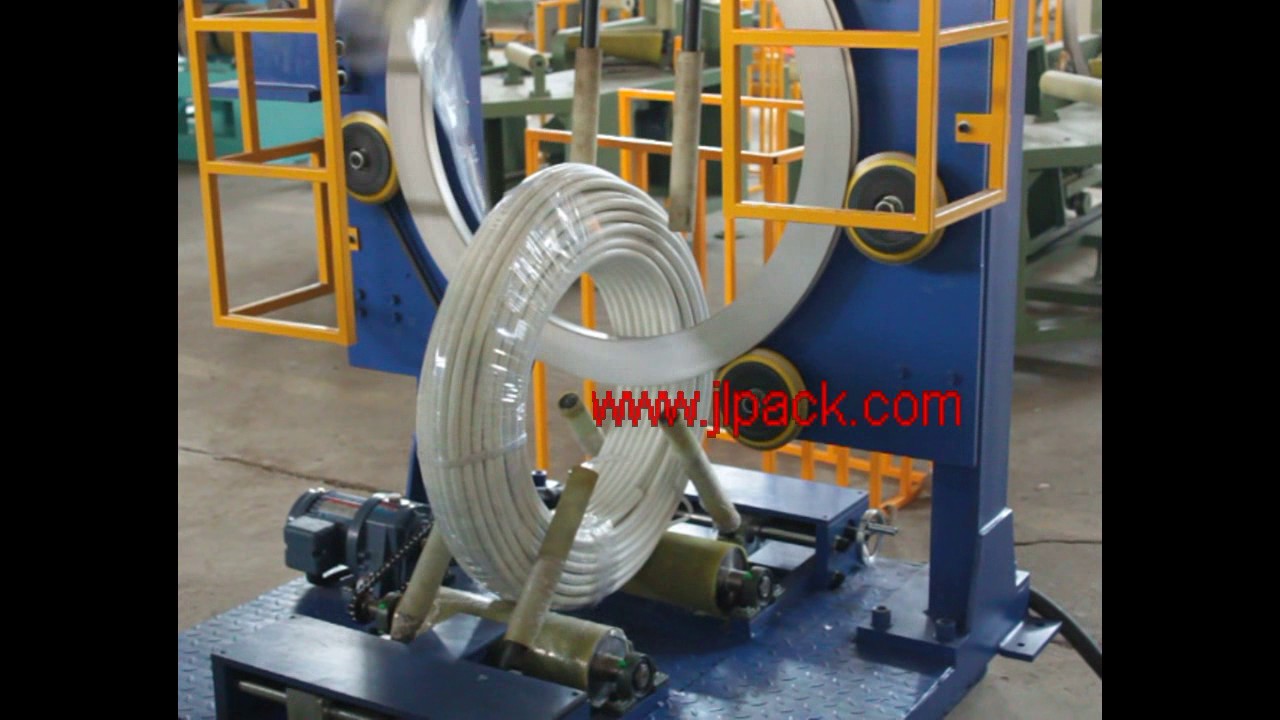 “Efficient packing machine for pipe coils” “Efficient packing machine for pipe coils”