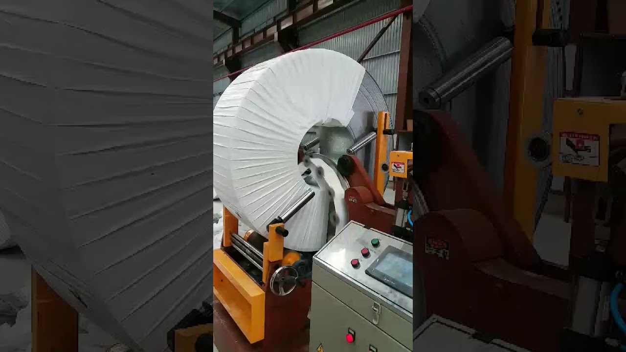 “Efficient packing machine for steel coils with optimized design.”