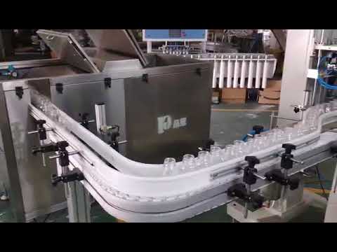 High-speed automatic bagger designed for small bottle packaging.