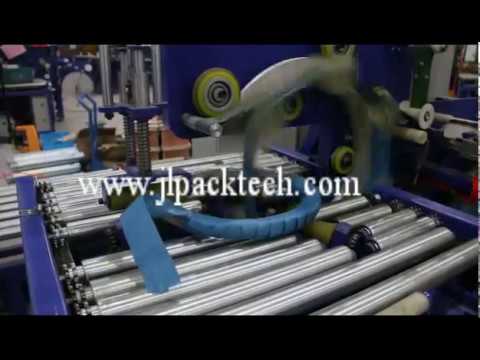 Horizontal coil packing machine for woven fabric tape, optimized for efficient performance.