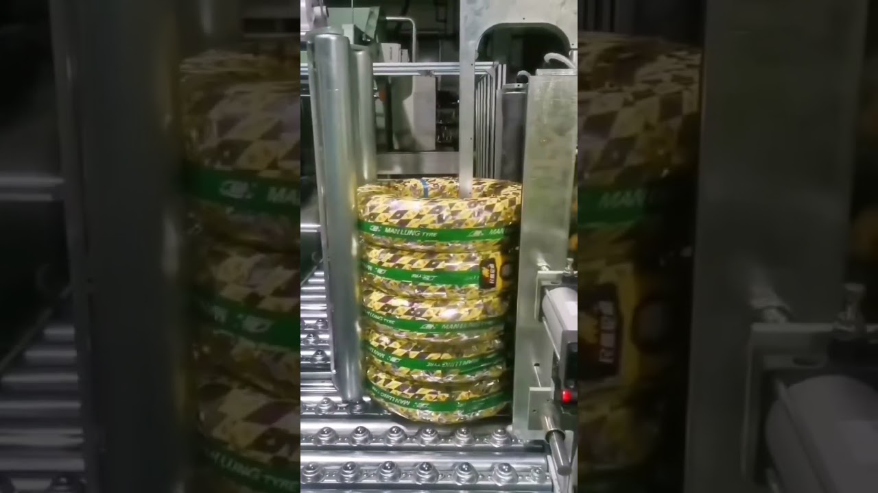 Improved Coil Strapping Machine for Tire, Hose and Pipe Packing.