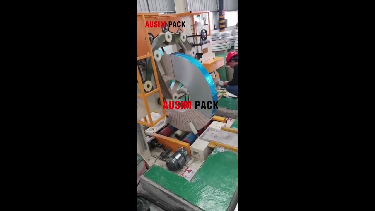 Machine for wrapping woven bags, paper rolls, and steel wire coils, suitable for packaging iron coils and equipped with a belt.