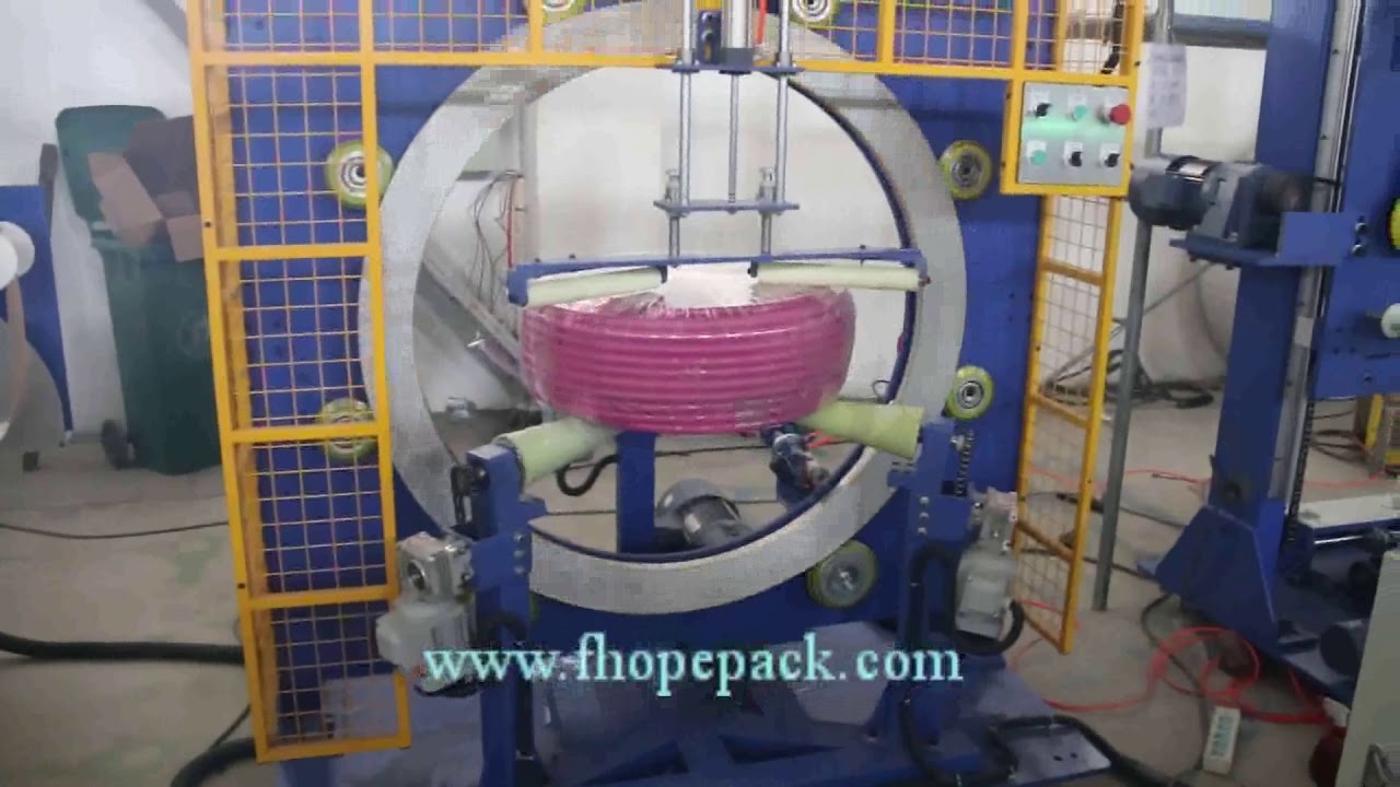 Optimized pipe coil wrapping machine with film in less than 35 words.