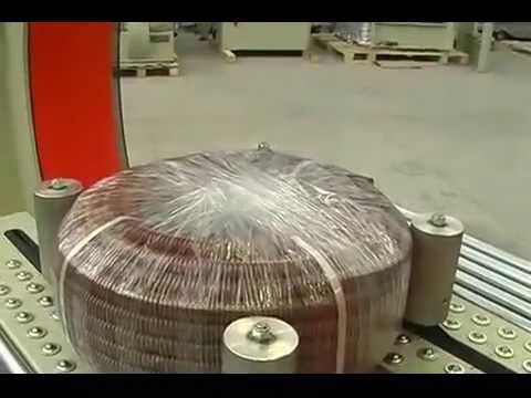 Packaging machine for hoses or coils, optimized for efficiency.
