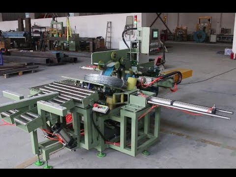 Packing and wrapping machine for wire coils, optimized for efficient operation. Packing and wrapping machine for wire coils, optimized for efficient operation.