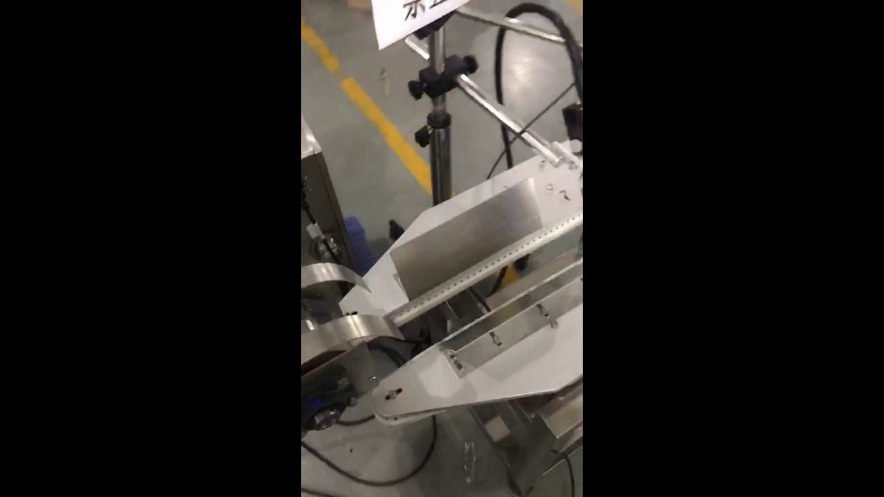 Revamp and streamline thread coiling and labeling machine for efficient automation within 35 words.