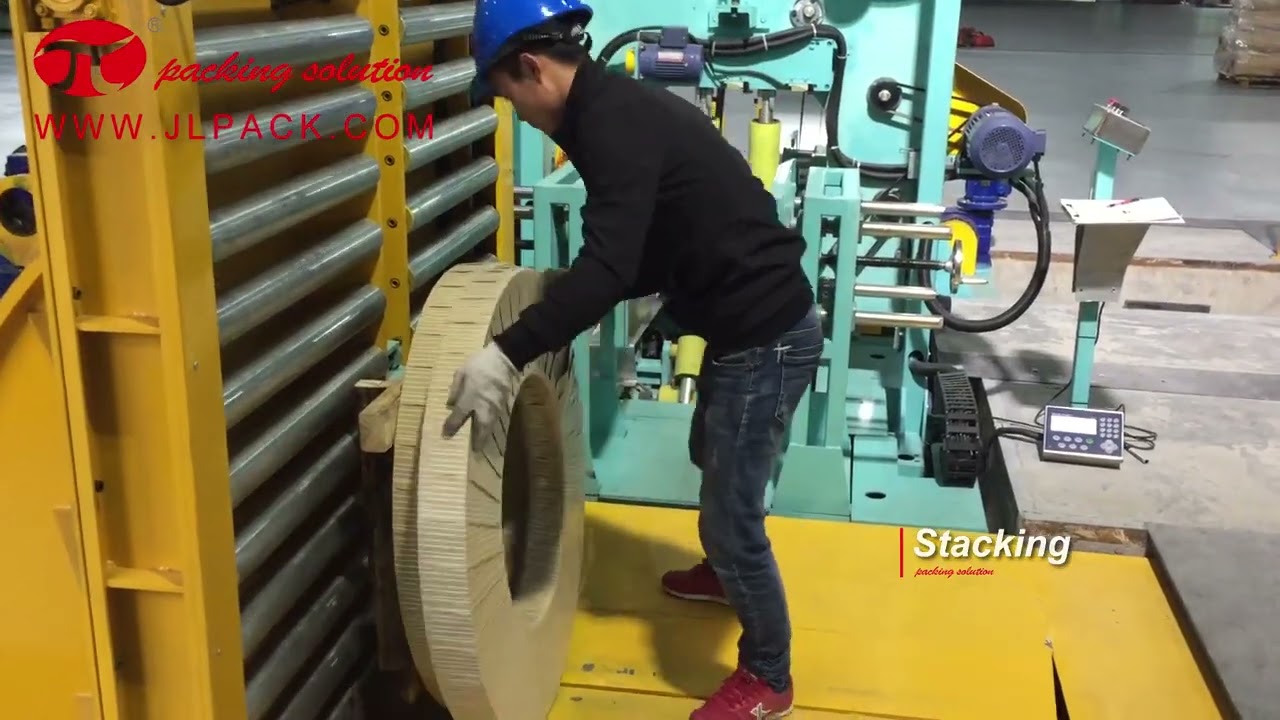 Semi-automatic steel coil packaging machine for vertical use, optimized for efficiency.