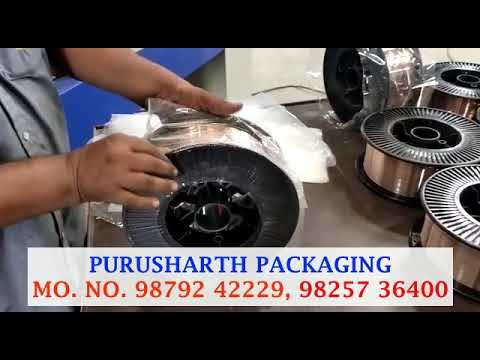 Shrink wrapping machine for welding wire, rods, and coils.