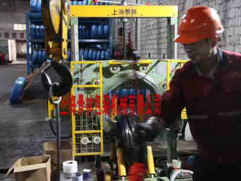 Steel wire coil packing machine that automates the packaging process for increased efficiency.