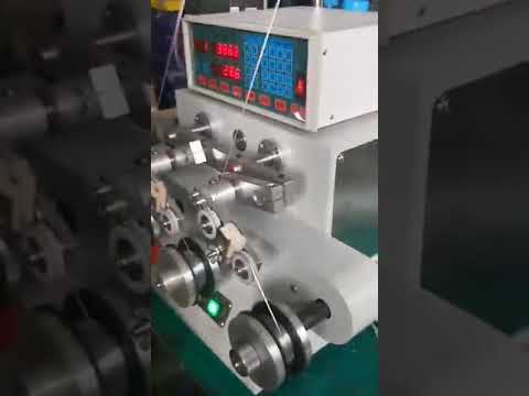 Steel wire winding machine for automated coil packing, optimized for efficiency.