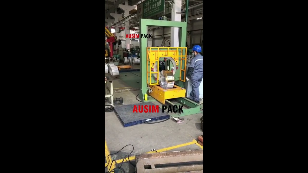 Vertical coil wrapping machine for steel and aluminum wire with trolley, designed for efficient packing.