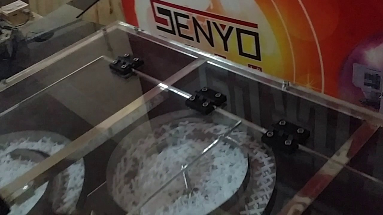 Weighing coil packaging machine with optimized packing capabilities.