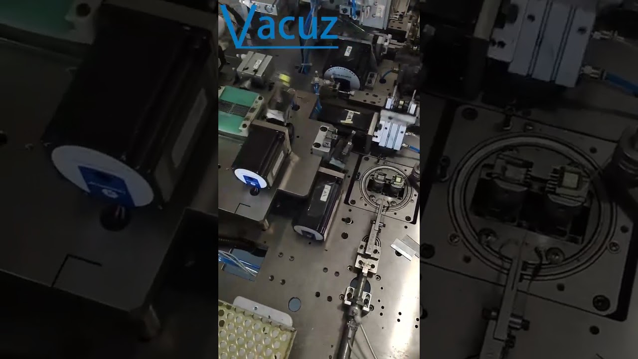 Automated Ferrite Core Wrapping Machine for Transformer Coil Insulation in Factory Automated Ferrite Core Wrapping Machine for Transformer Coil Insulation in Factory