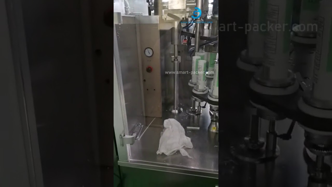 “Efficient Rotary Hose Filling & Sealing Machine in Action”