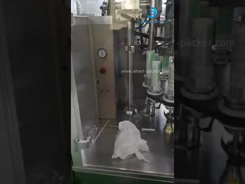 “Efficient Rotary Loading, Filling, Sealing, and Packing Machine in Action”