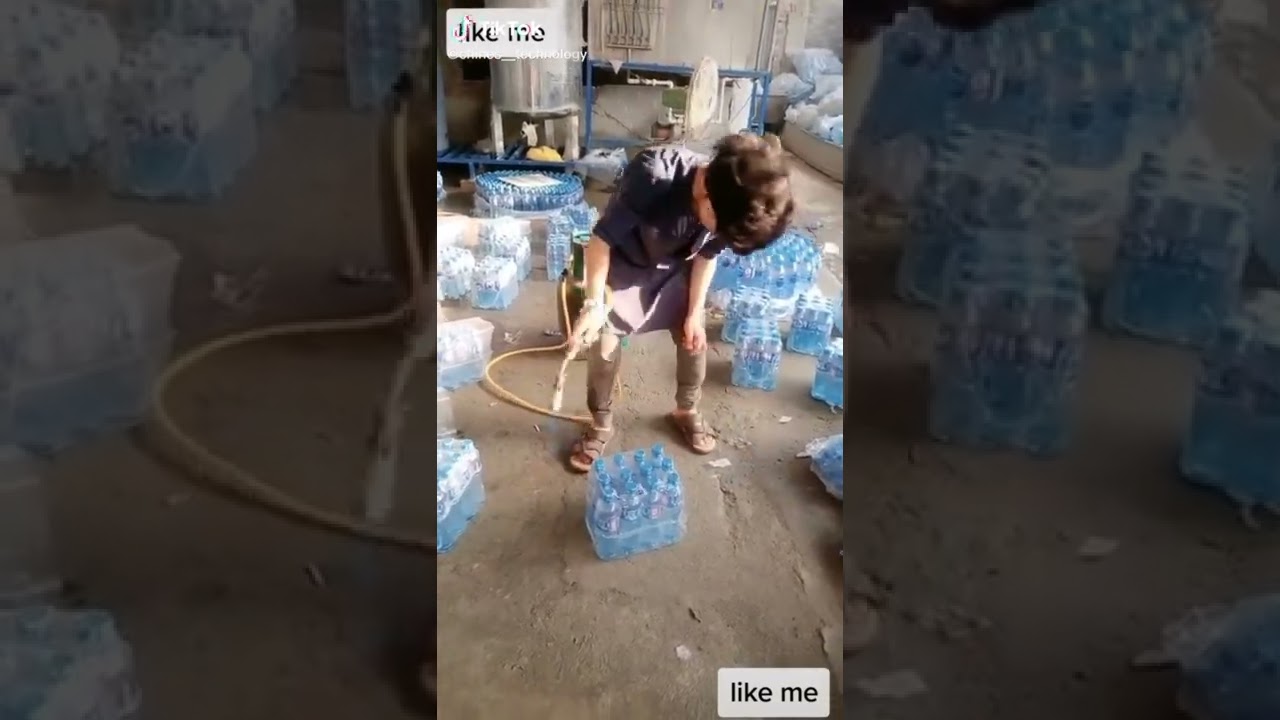 “Efficient Water Bottle Packing Machine: Enhanced Performance, Compact Design”