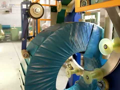 “Enhanced Coil Wrapping Machine Incorporating Tapping for Increased Efficiency” “Enhanced Coil Wrapping Machine Incorporating Tapping for Increased Efficiency”