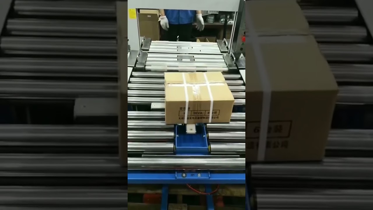 “Revolutionary Strapping System: Automated PP Strapper with Advanced Lifting, Rotating, and Cross Strapping Capabilities”