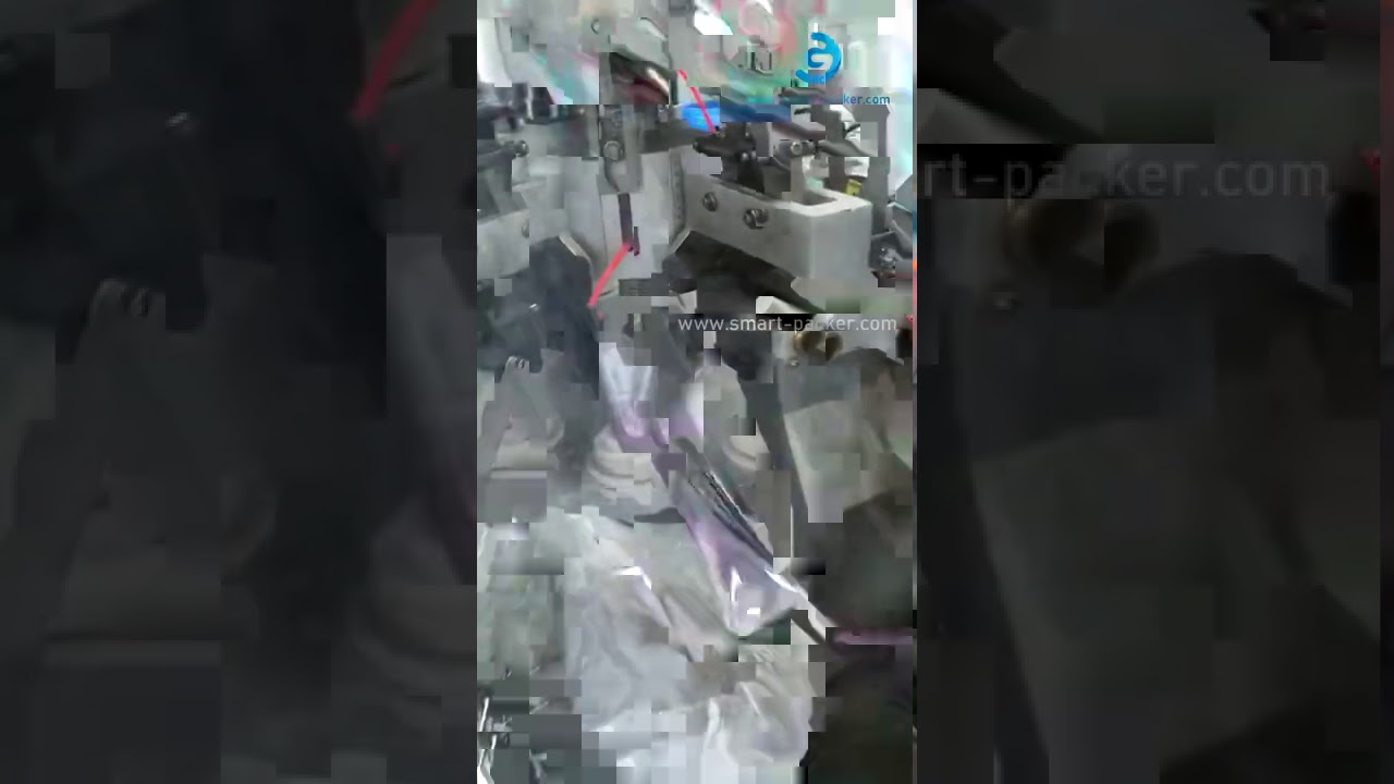 Soft tube filling and sealing machine with vibrant colors, now automated for efficient packaging. Soft tube filling and sealing machine with vibrant colors, now automated for efficient packaging.