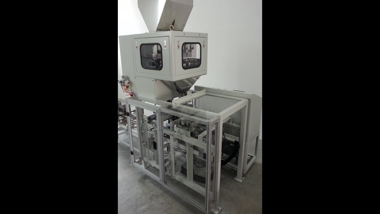 Bag Filling and Sealing Machine Bag Filling and Sealing Machine