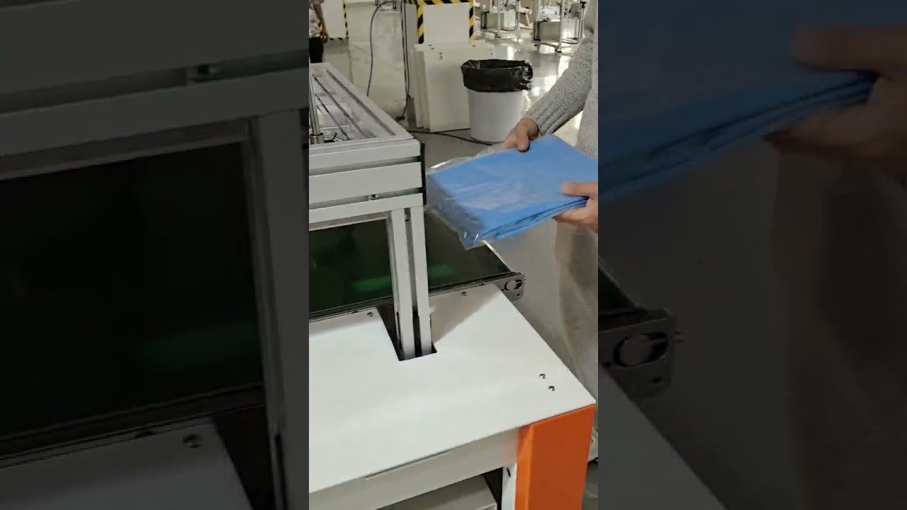 Automated Gown Folding and Bagging Machine