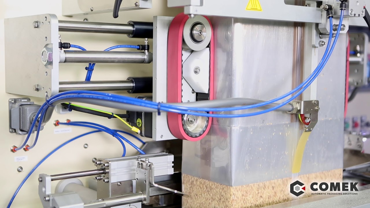 Automated Vacuum Packing Machine for Bulk Block-Bottom Bags by Paxon Packaging