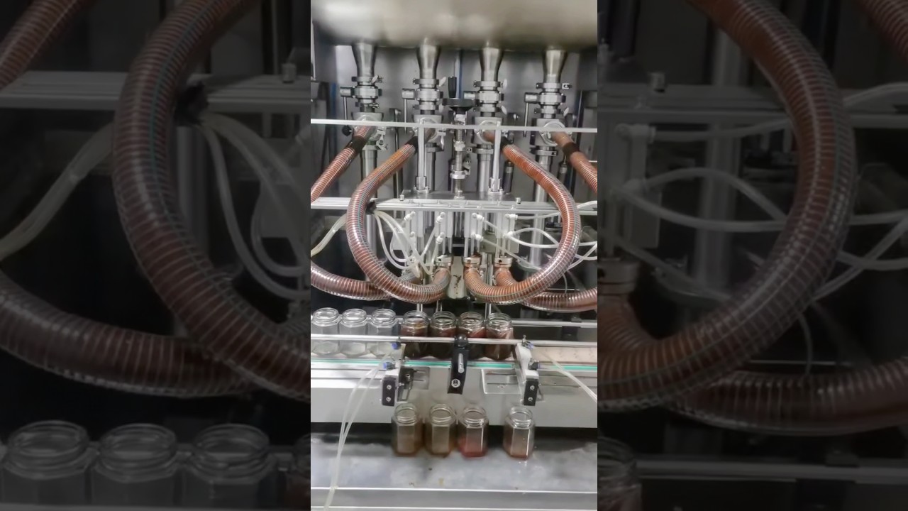 Automatic Glass Bottle Filling and Packaging Machine Automatic Glass Bottle Filling and Packaging Machine