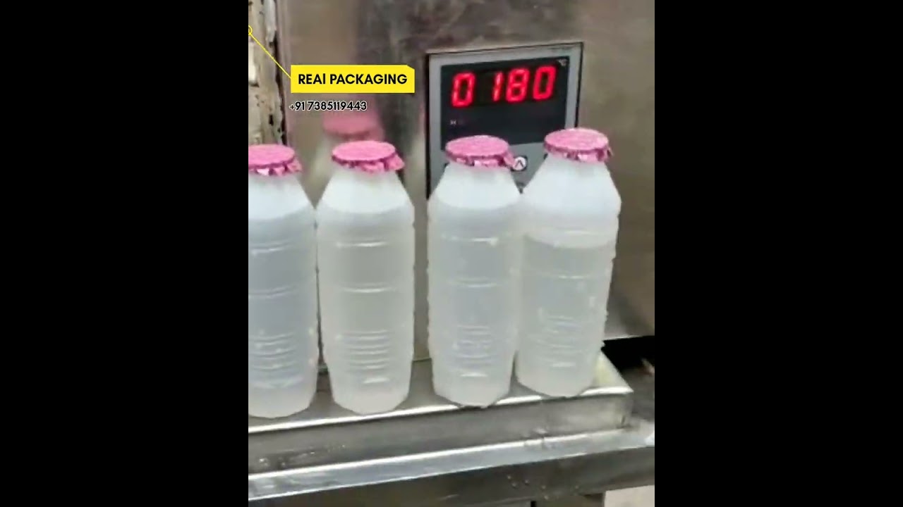 Automatic Litchi Bottle Filling and Foil Sealing Machine Automatic Litchi Bottle Filling and Foil Sealing Machine