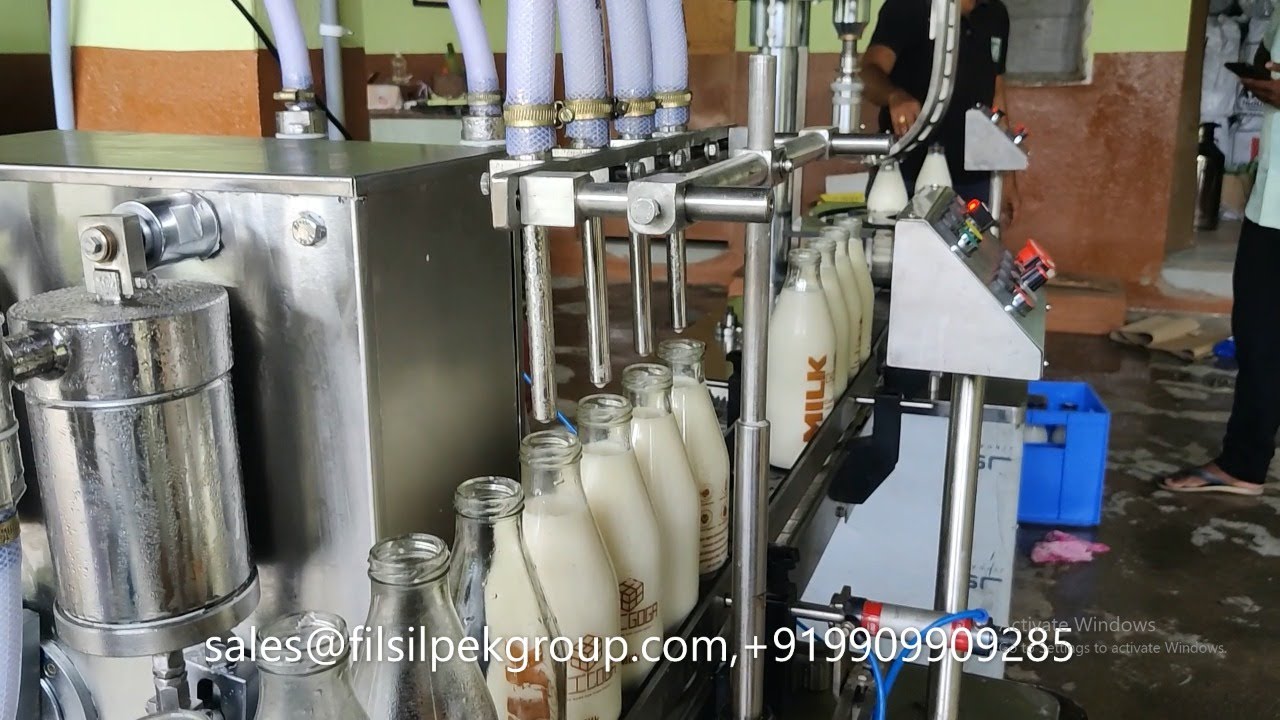 Bottle Filling and Capping Machine for Milk Packaging Bottle Filling and Capping Machine for Milk Packaging