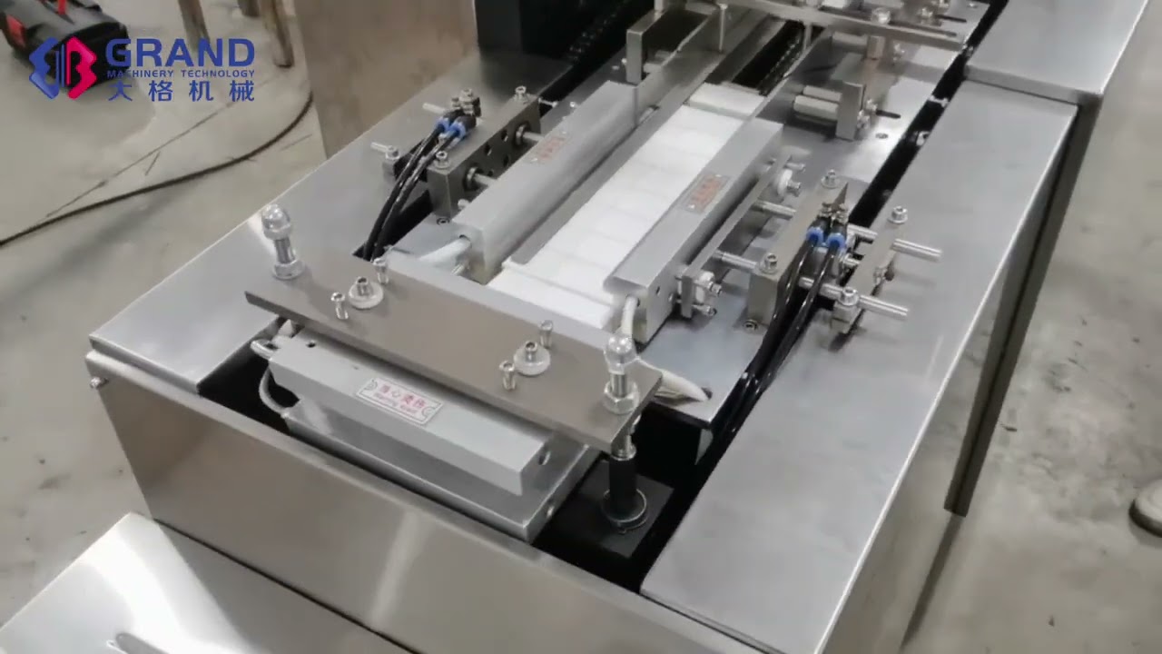 Film Wrapping and Packing Machine Film Wrapping and Packing Machine