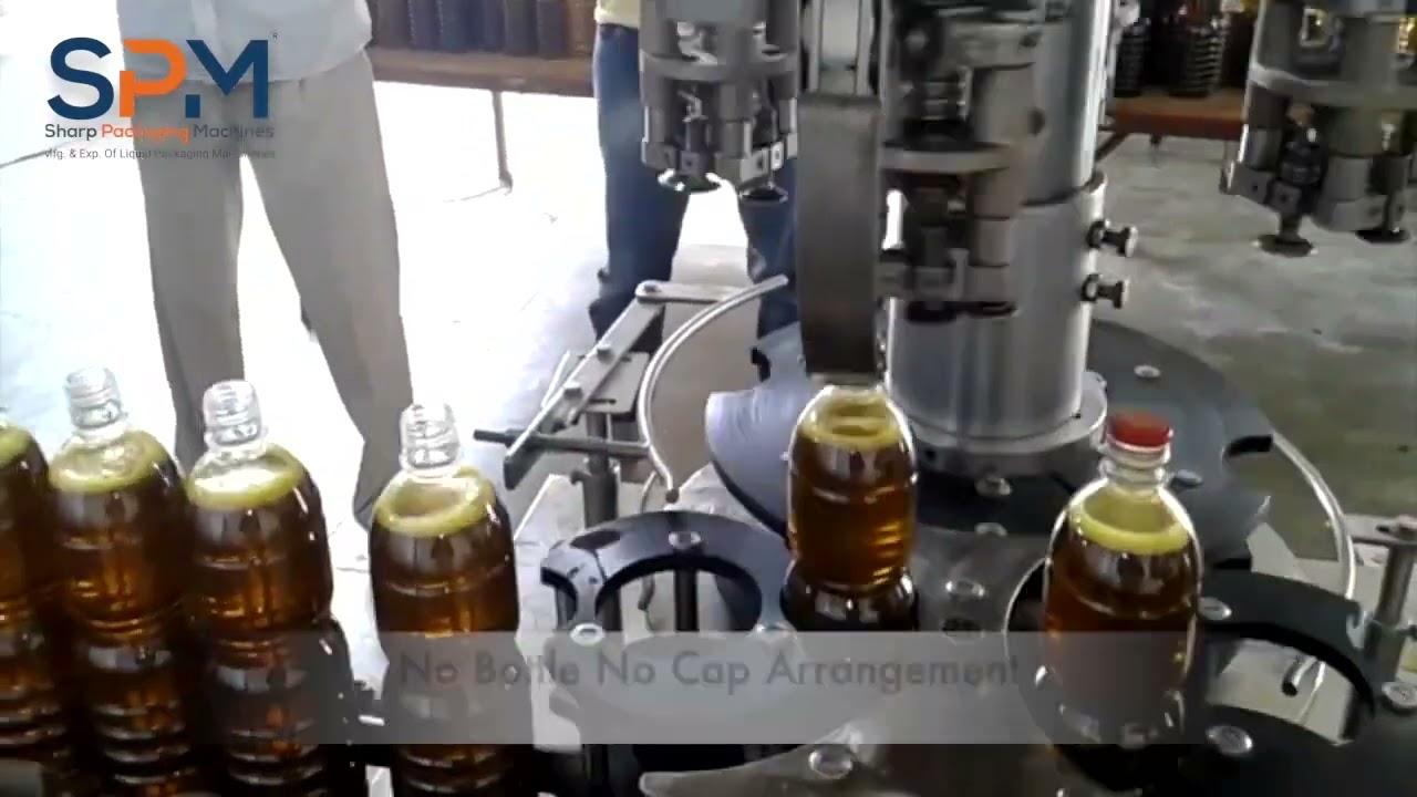 Mustard Oil Bottle Filling and Capping Machine Mustard Oil Bottle Filling and Capping Machine